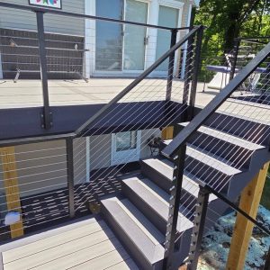 Black aluminum exterior stairs on a lakefront home, West Michigan aluminum stair builders