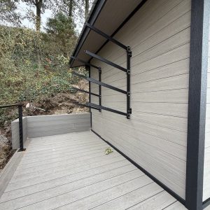 Composite deck beside a beach cabana above Lake Michigan, composite deck builders West Michigan