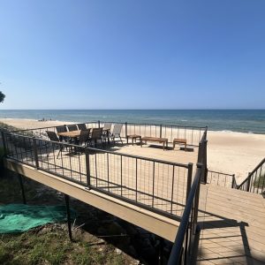 Wood beach deck with stairs to the sand on Lake Michigan, wood deck and stair builders